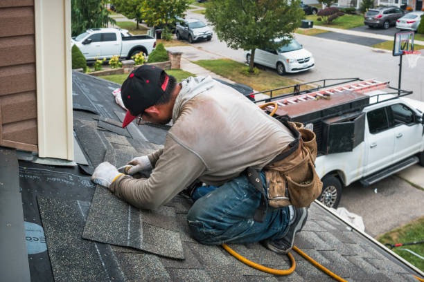 Professional Roof Replacement technician working in Hazelton, ID